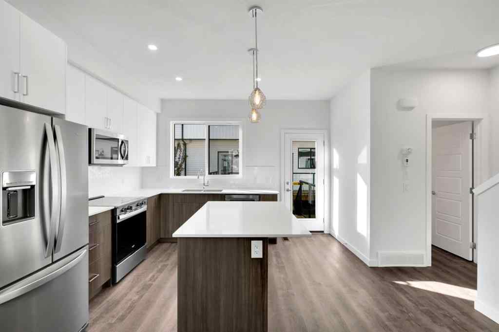 MLS® A2248756 - Unit #305 340 Ambleton Street NW in Moraine Calgary, Residential
