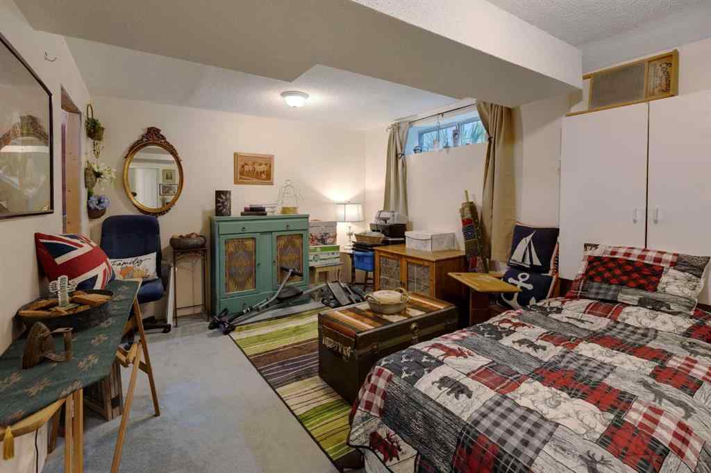 MLS® A2248776 - 234 Quigley Drive  in West Terrace Cochrane, Residential