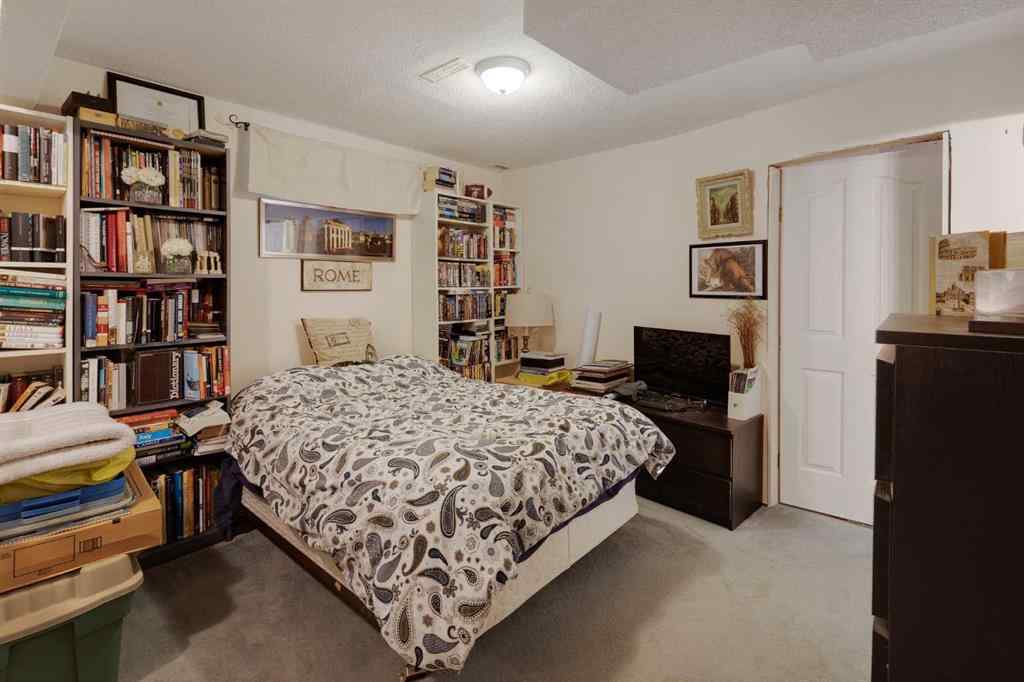 MLS® A2248776 - 234 Quigley Drive  in West Terrace Cochrane, Residential