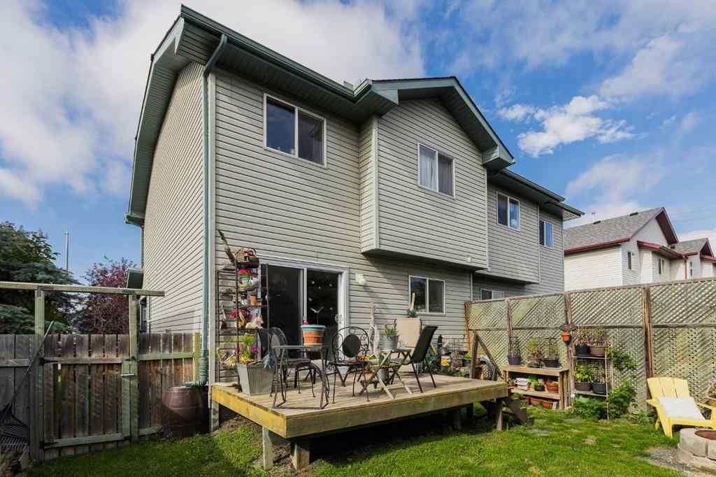 MLS® A2248776 - 234 Quigley Drive  in West Terrace Cochrane, Residential