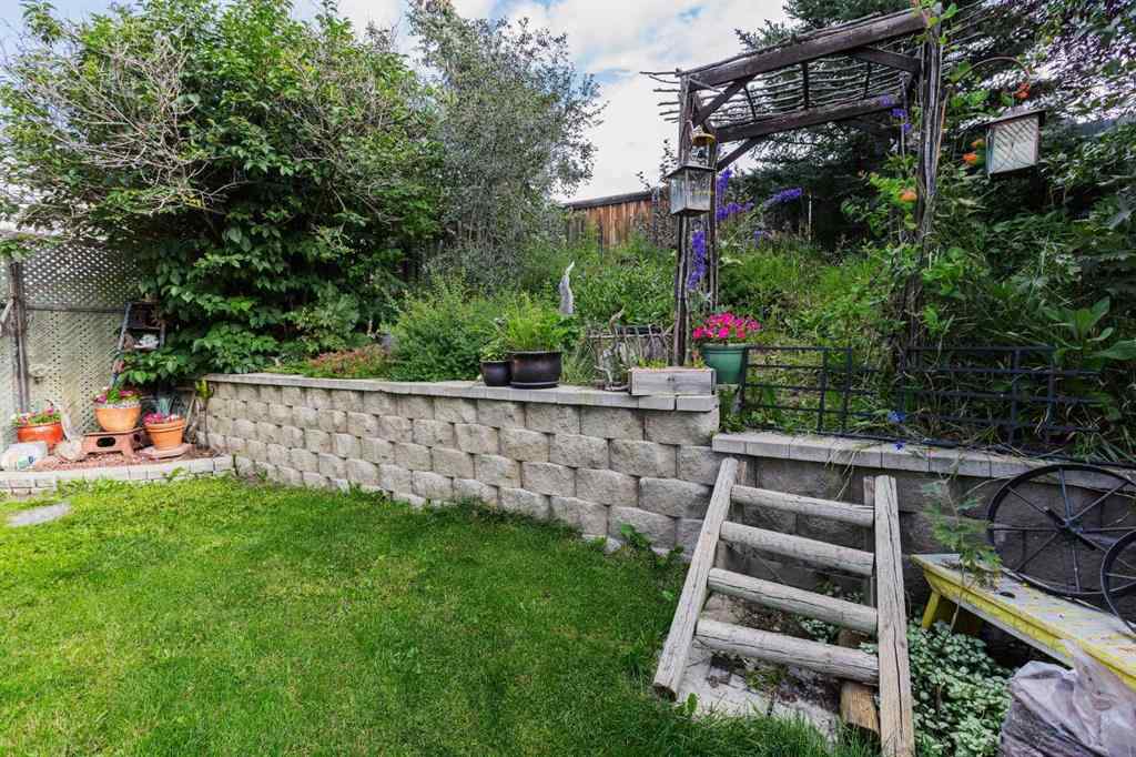 MLS® A2248776 - 234 Quigley Drive  in West Terrace Cochrane, Residential