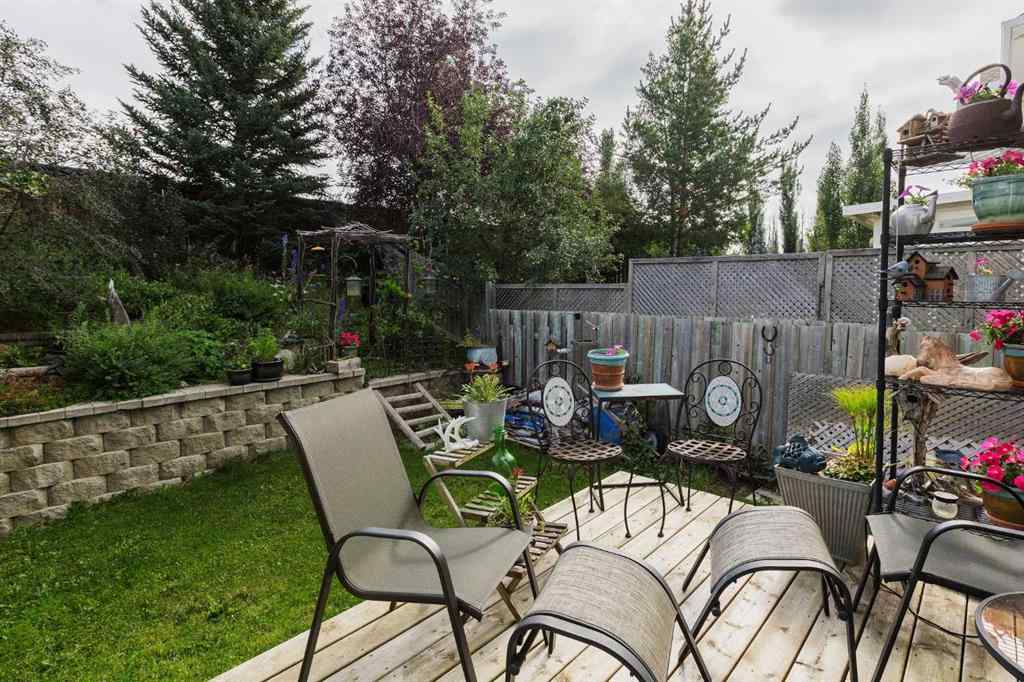 MLS® A2248776 - 234 Quigley Drive  in West Terrace Cochrane, Residential