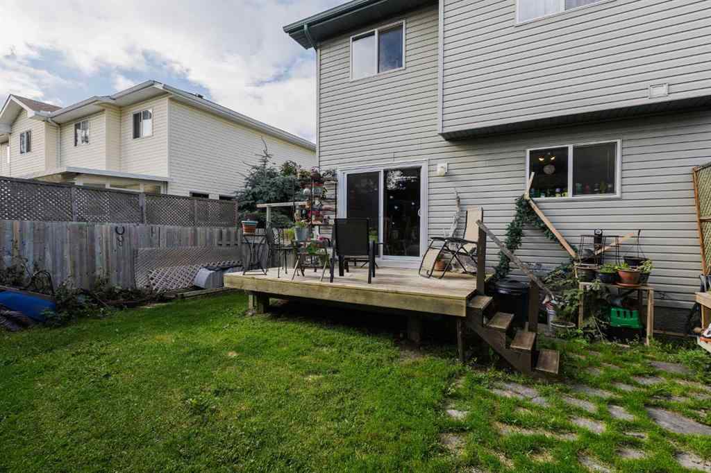 MLS® A2248776 - 234 Quigley Drive  in West Terrace Cochrane, Residential