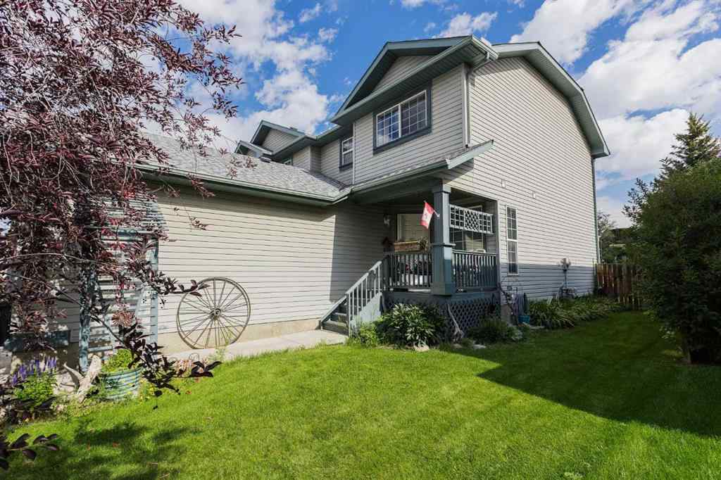 MLS® A2248776 - 234 Quigley Drive  in West Terrace Cochrane, Residential