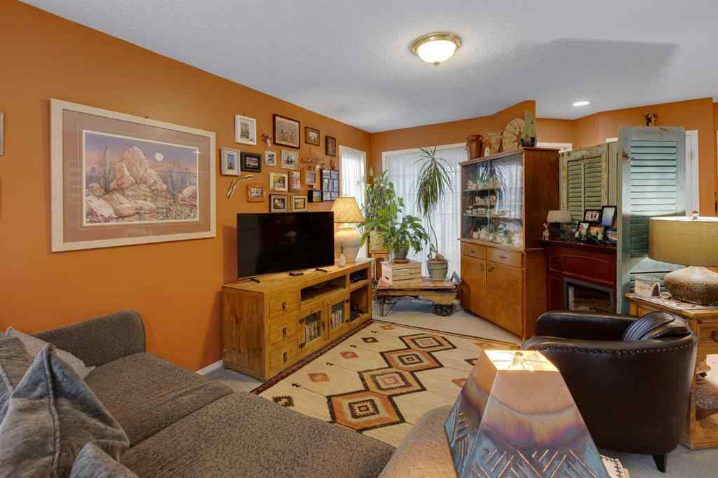 MLS® A2248776 - 234 Quigley Drive  in West Terrace Cochrane, Residential