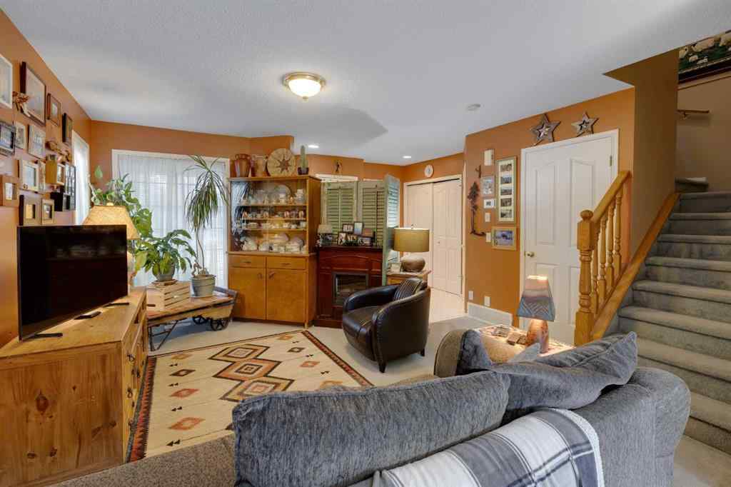MLS® A2248776 - 234 Quigley Drive  in West Terrace Cochrane, Residential