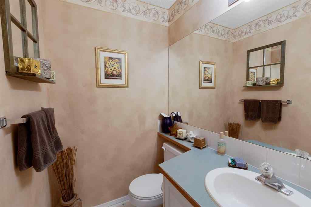 MLS® A2248776 - 234 Quigley Drive  in West Terrace Cochrane, Residential