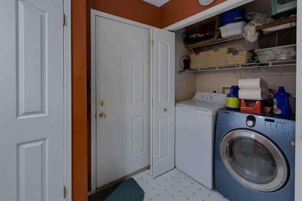 MLS® A2248776 - 234 Quigley Drive  in West Terrace Cochrane, Residential