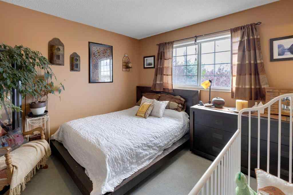 MLS® A2248776 - 234 Quigley Drive  in West Terrace Cochrane, Residential