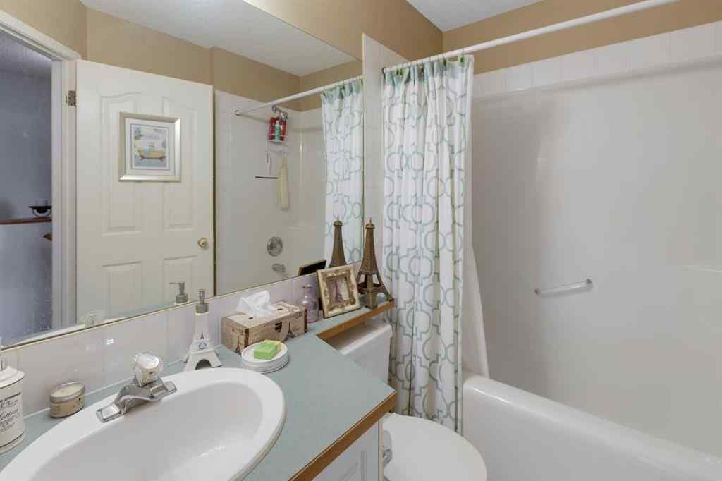 MLS® A2248776 - 234 Quigley Drive  in West Terrace Cochrane, Residential