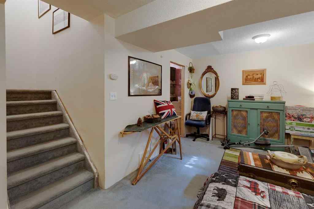 MLS® A2248776 - 234 Quigley Drive  in West Terrace Cochrane, Residential