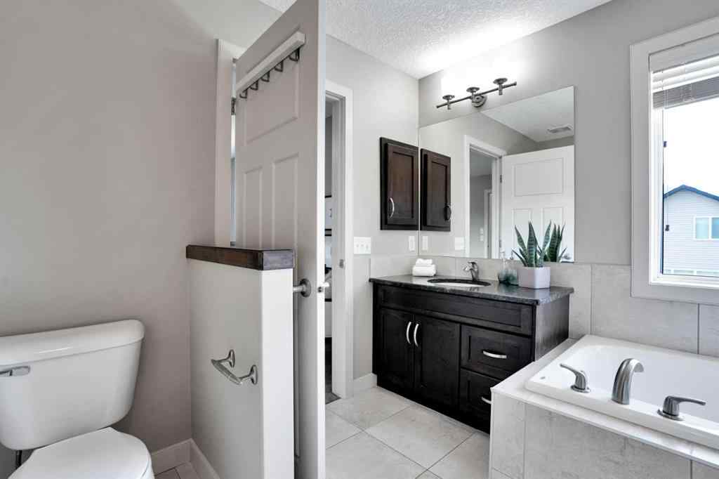MLS® A2248821 - 107 Everhollow Street SW in Evergreen Calgary, Residential