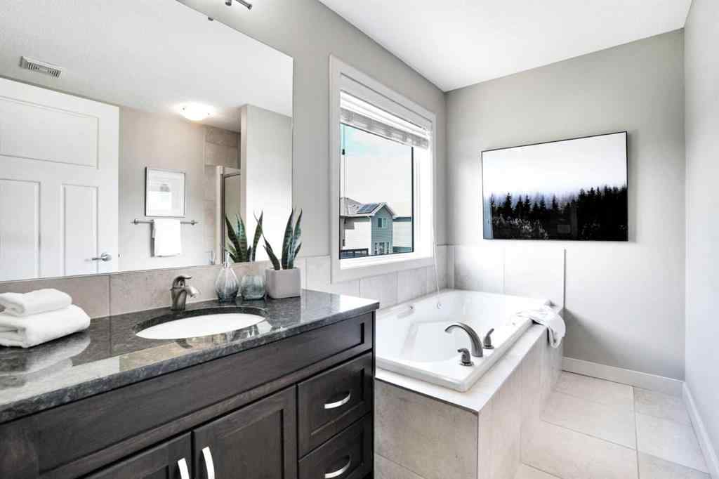 MLS® A2248821 - 107 Everhollow Street SW in Evergreen Calgary, Residential