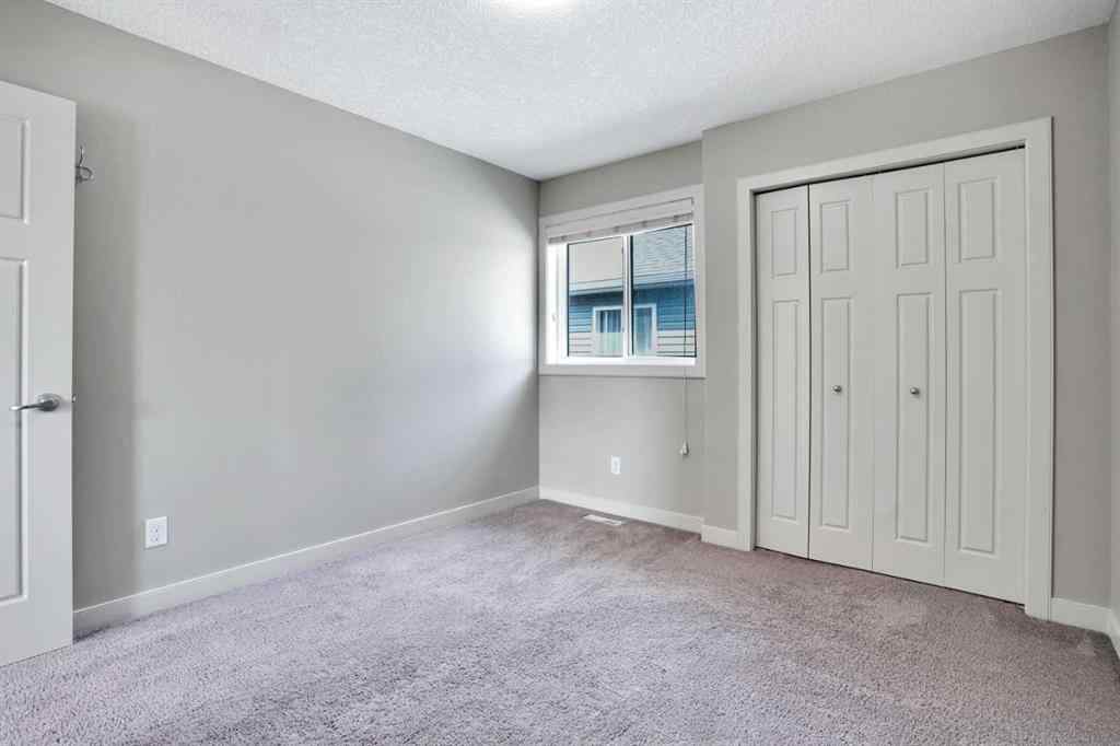 MLS® A2248821 - 107 Everhollow Street SW in Evergreen Calgary, Residential