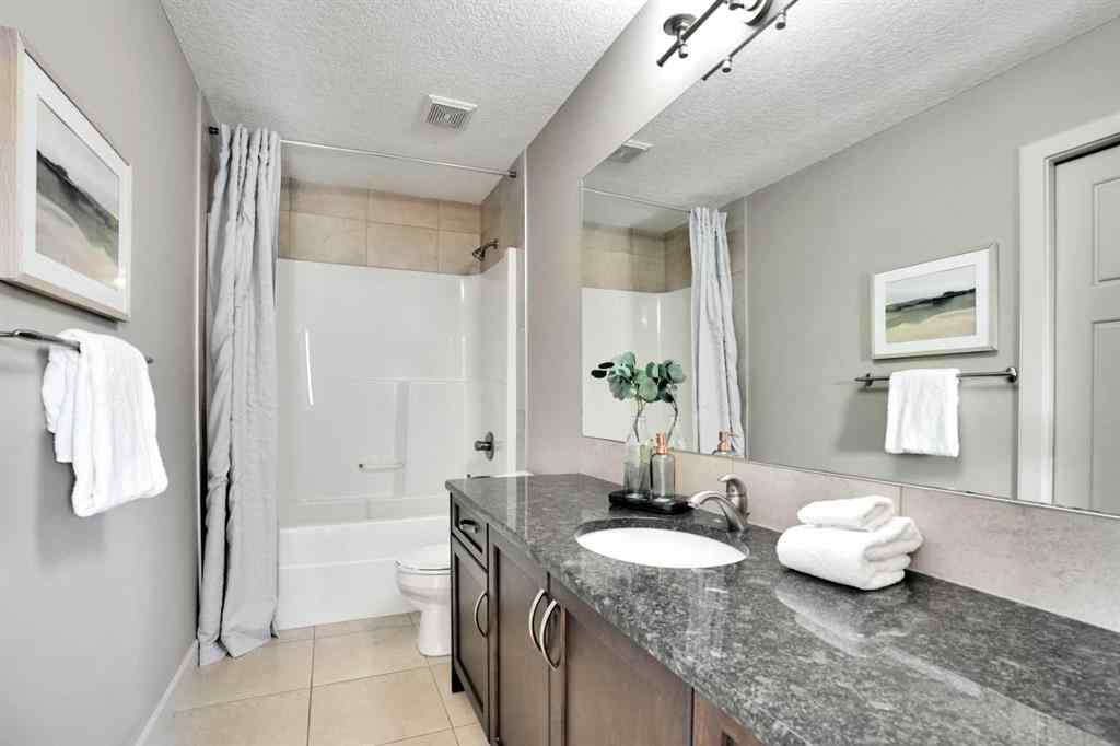 MLS® A2248821 - 107 Everhollow Street SW in Evergreen Calgary, Residential