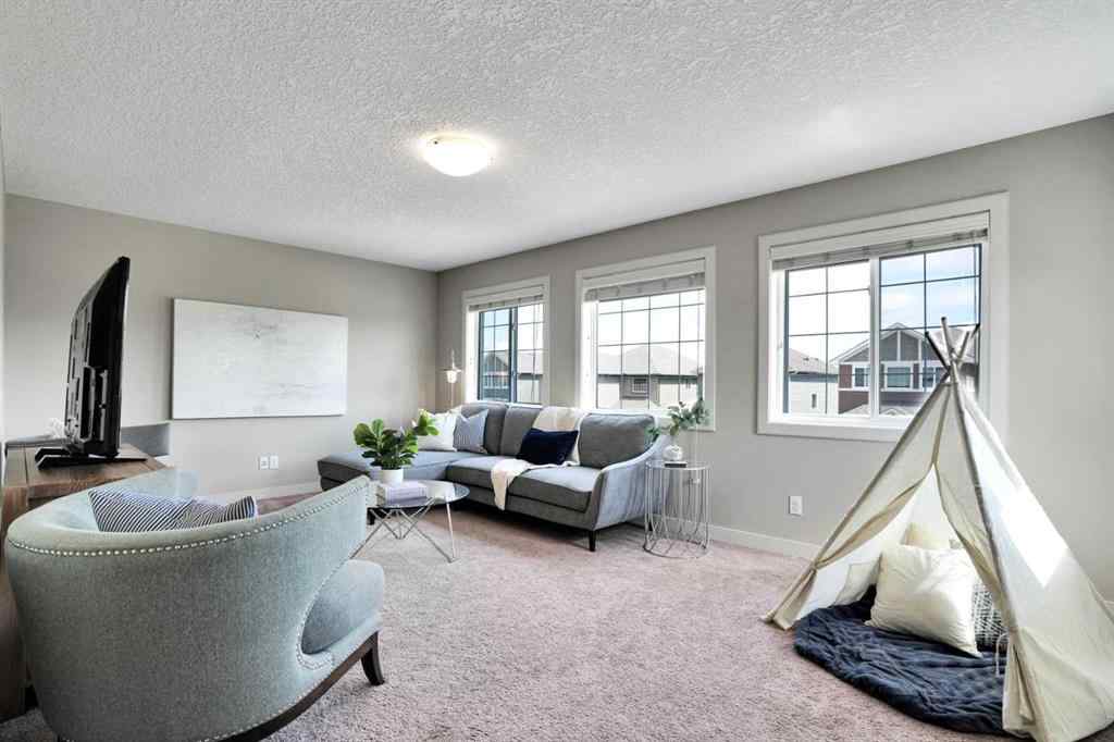 MLS® A2248821 - 107 Everhollow Street SW in Evergreen Calgary, Residential