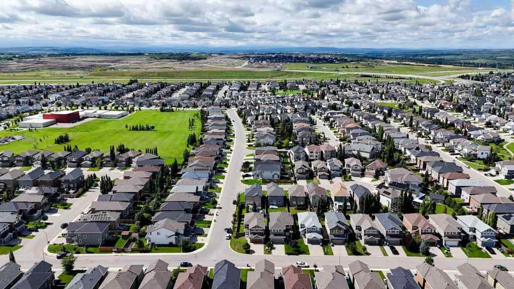 MLS® A2248821 - 107 Everhollow Street SW in Evergreen Calgary, Residential