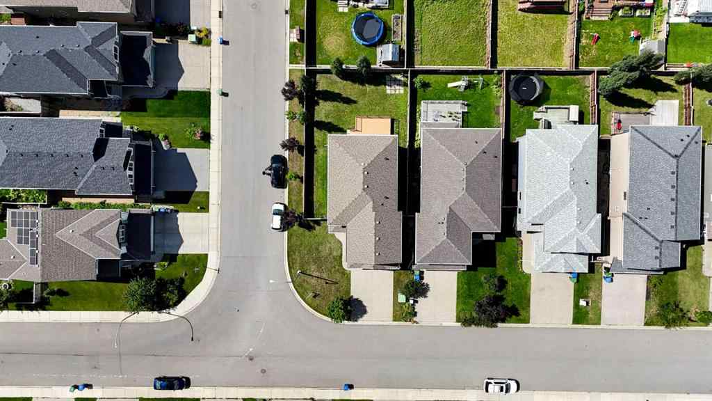 MLS® A2248821 - 107 Everhollow Street SW in Evergreen Calgary, Residential