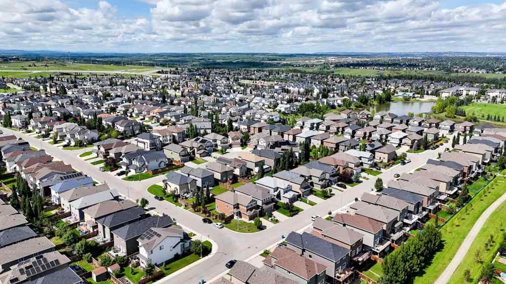 MLS® A2248821 - 107 Everhollow Street SW in Evergreen Calgary, Residential