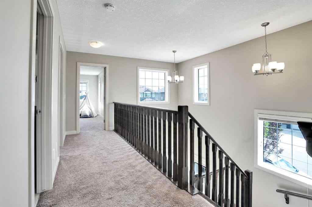 MLS® A2248821 - 107 Everhollow Street SW in Evergreen Calgary, Residential