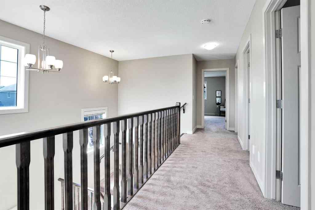 MLS® A2248821 - 107 Everhollow Street SW in Evergreen Calgary, Residential