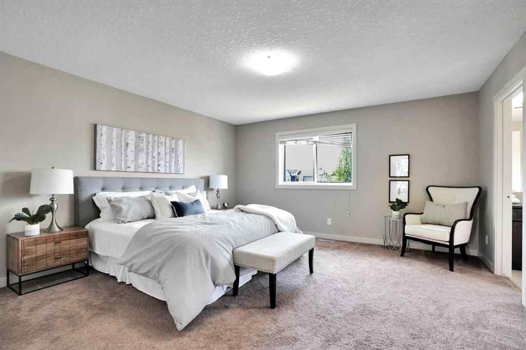 MLS® A2248821 - 107 Everhollow Street SW in Evergreen Calgary, Residential