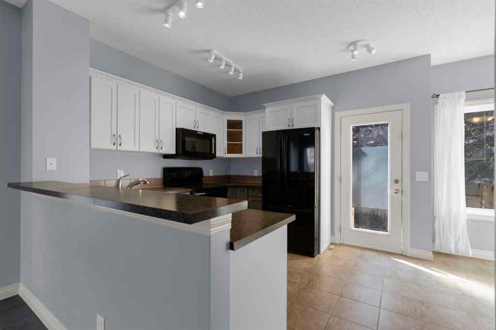 MLS® A2248839 - 211 Strathaven Mews  in Strathaven Strathmore, Residential