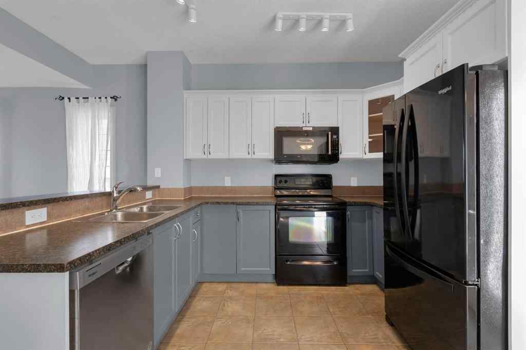 MLS® A2248839 - 211 Strathaven Mews  in Strathaven Strathmore, Residential