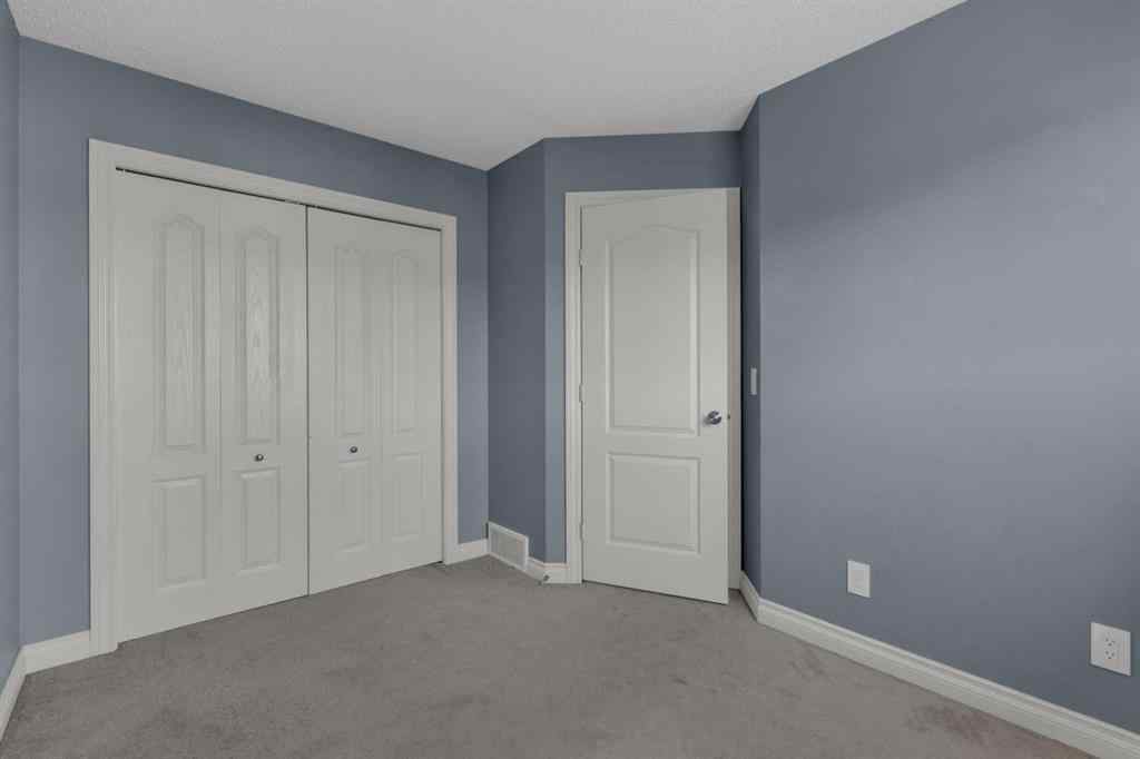 MLS® A2248839 - 211 Strathaven Mews  in Strathaven Strathmore, Residential