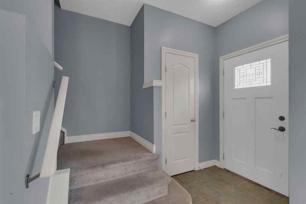 MLS® A2248839 - 211 Strathaven Mews  in Strathaven Strathmore, Residential