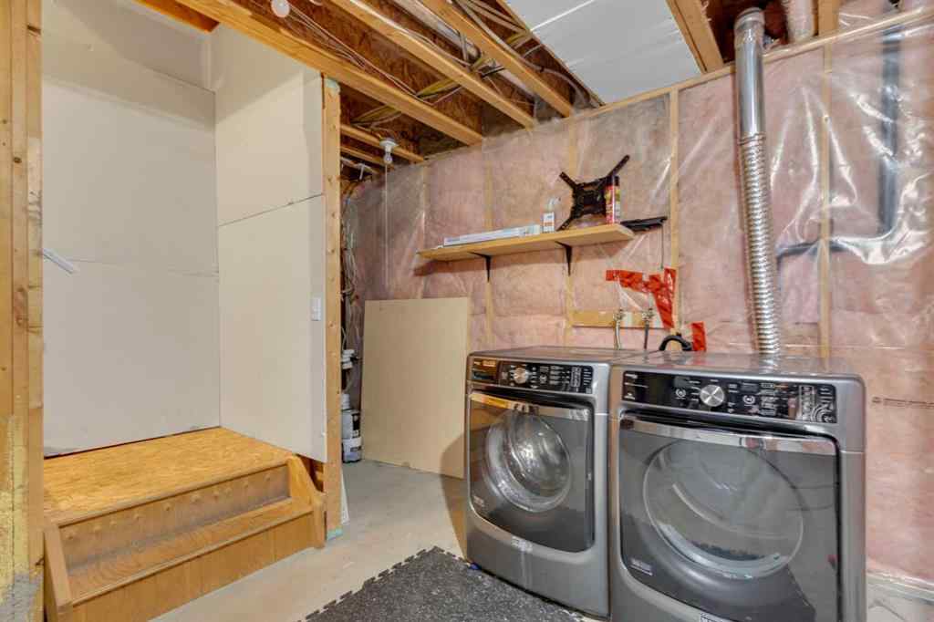 MLS® A2248839 - 211 Strathaven Mews  in Strathaven Strathmore, Residential