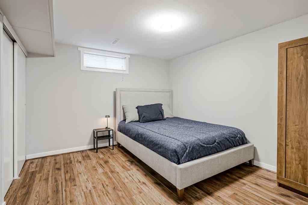 MLS® A2248857 - 208 Woodpark Place SW in Woodlands Calgary, Residential