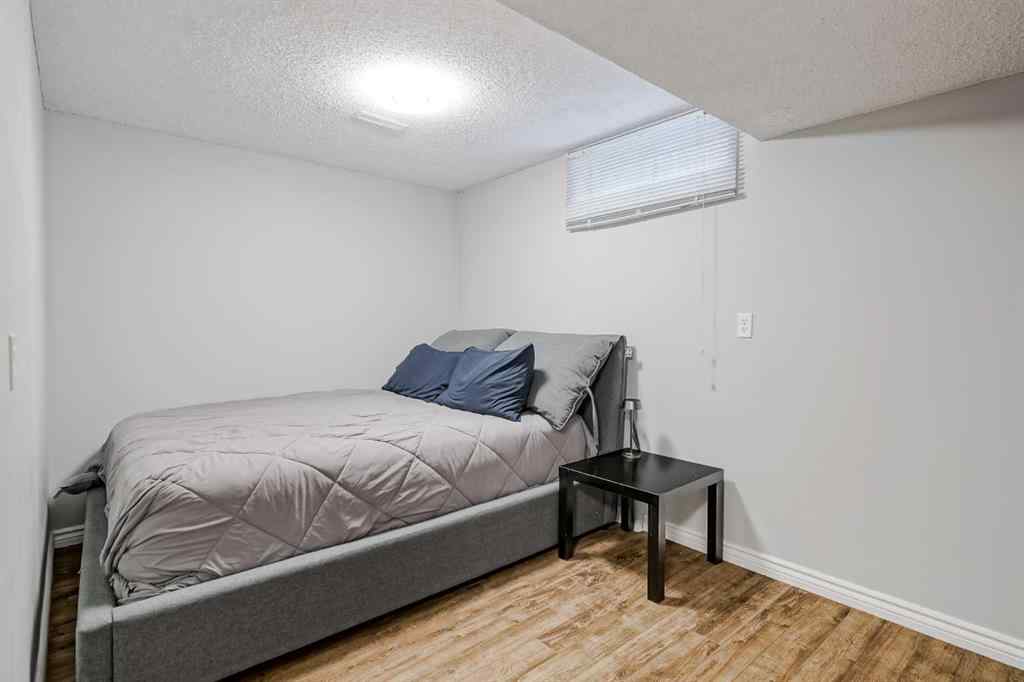 MLS® A2248857 - 208 Woodpark Place SW in Woodlands Calgary, Residential