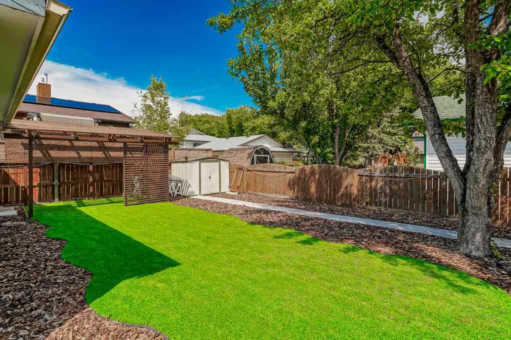 MLS® A2248857 - 208 Woodpark Place SW in Woodlands Calgary, Residential