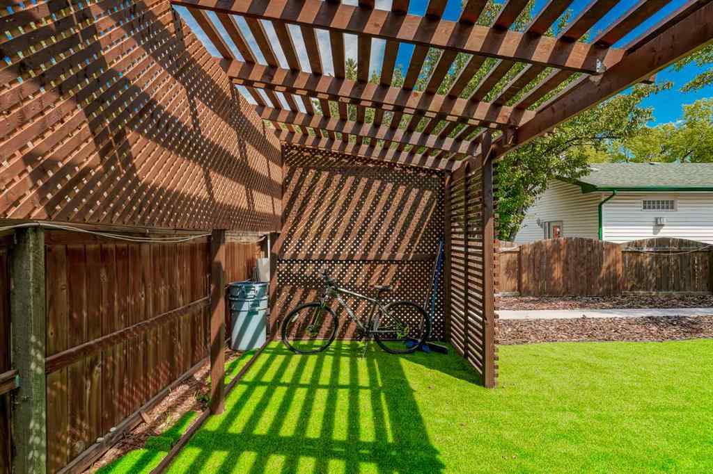 MLS® A2248857 - 208 Woodpark Place SW in Woodlands Calgary, Residential