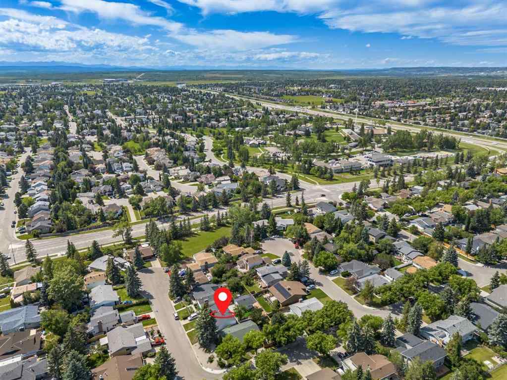 MLS® A2248857 - 208 Woodpark Place SW in Woodlands Calgary, Residential