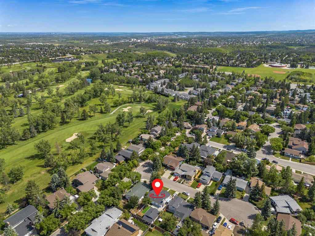 MLS® A2248857 - 208 Woodpark Place SW in Woodlands Calgary, Residential