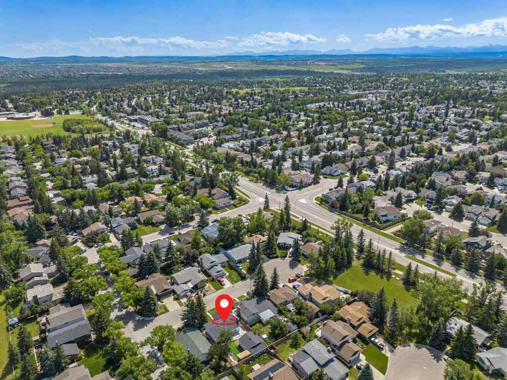 MLS® A2248857 - 208 Woodpark Place SW in Woodlands Calgary, Residential