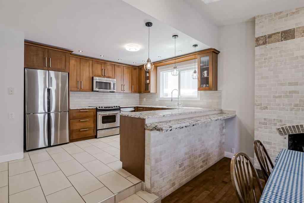 MLS® A2248857 - 208 Woodpark Place SW in Woodlands Calgary, Residential