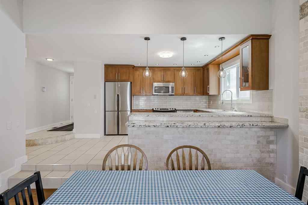 MLS® A2248857 - 208 Woodpark Place SW in Woodlands Calgary, Residential