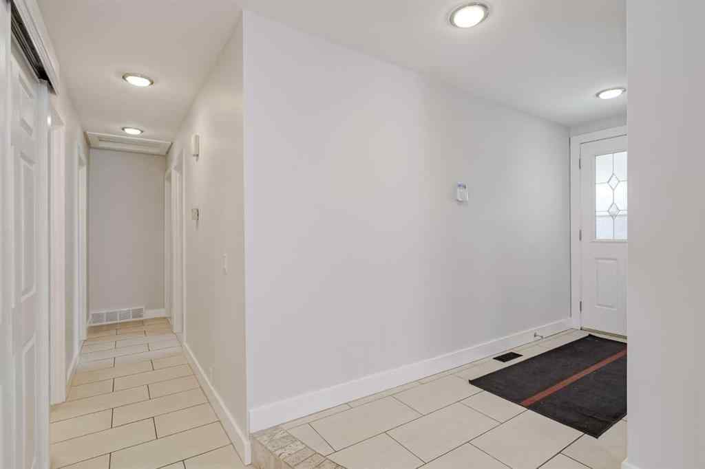 MLS® A2248857 - 208 Woodpark Place SW in Woodlands Calgary, Residential