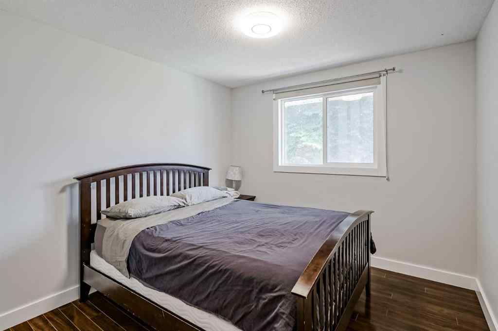 MLS® A2248857 - 208 Woodpark Place SW in Woodlands Calgary, Residential