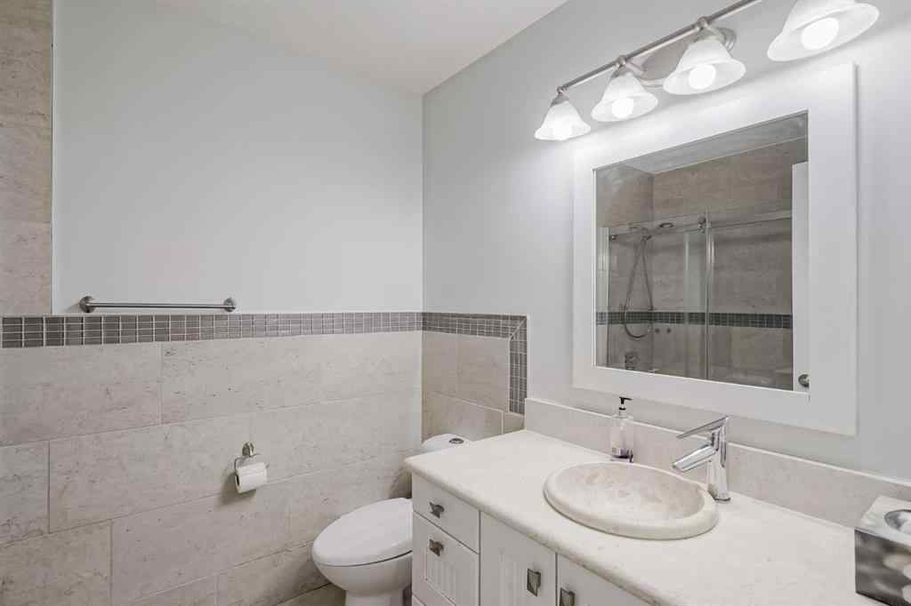MLS® A2248857 - 208 Woodpark Place SW in Woodlands Calgary, Residential