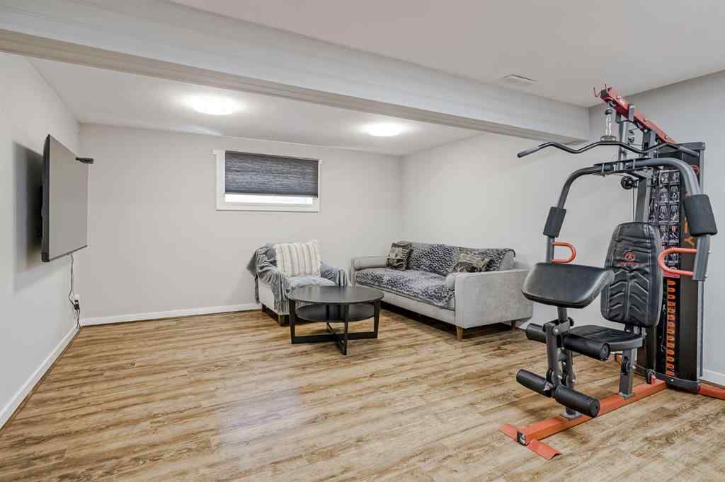 MLS® A2248857 - 208 Woodpark Place SW in Woodlands Calgary, Residential