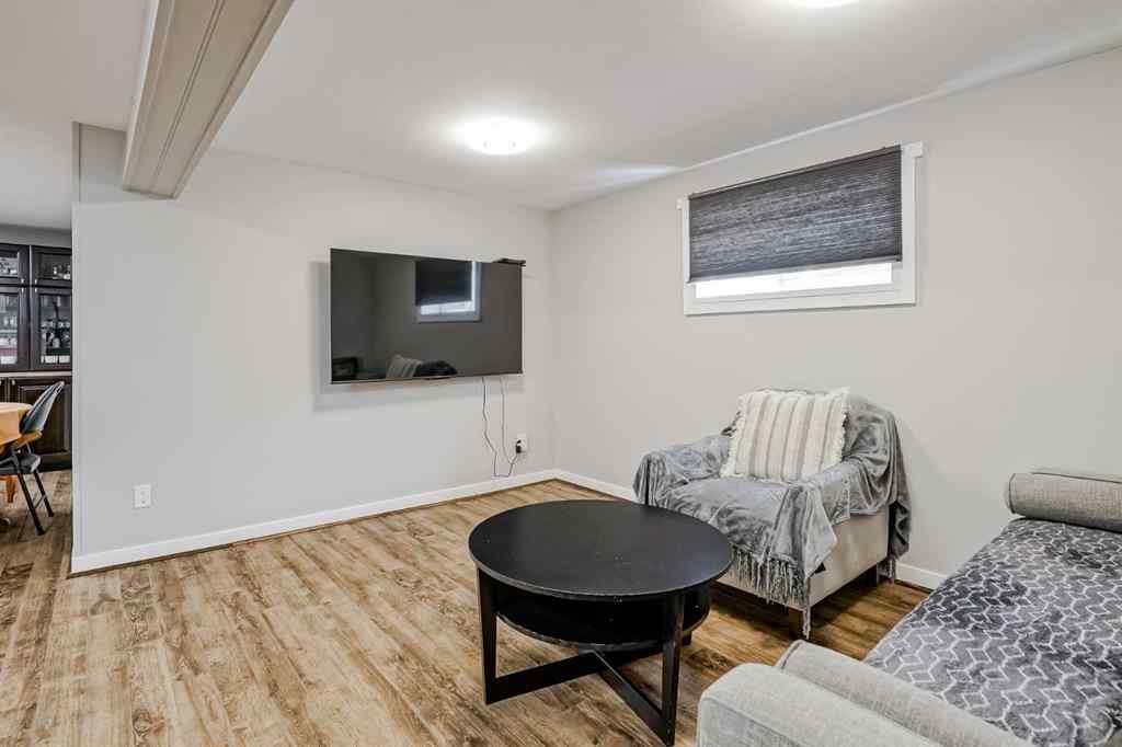 MLS® A2248857 - 208 Woodpark Place SW in Woodlands Calgary, Residential