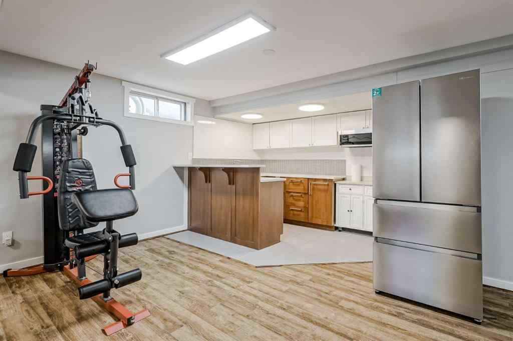 MLS® A2248857 - 208 Woodpark Place SW in Woodlands Calgary, Residential