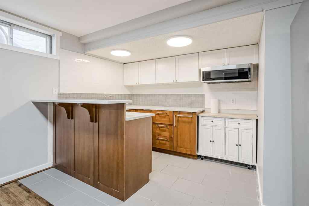 MLS® A2248857 - 208 Woodpark Place SW in Woodlands Calgary, Residential