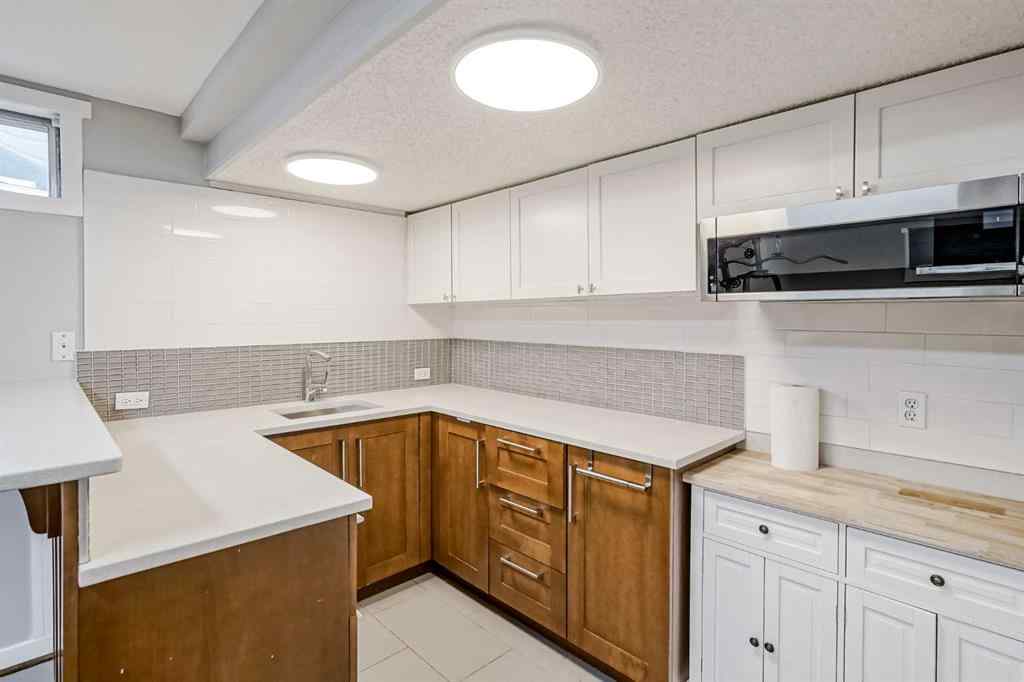 MLS® A2248857 - 208 Woodpark Place SW in Woodlands Calgary, Residential