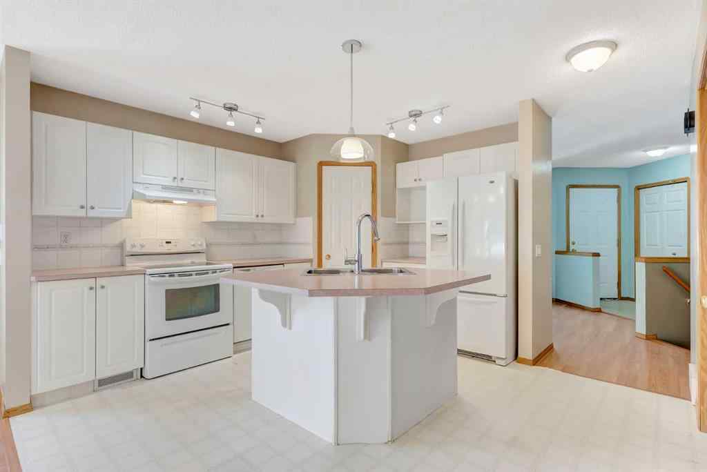 MLS® A2248861 - 155 Douglas Glen Close SE in Douglasdale/Glen Calgary, Residential