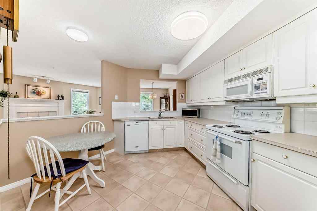 MLS® A2248920 - Unit #213 9449 19 Street SW in Palliser Calgary, Residential